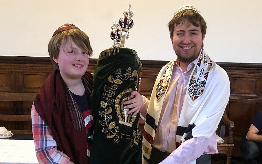 Esther Thorpe, left, who identifies as non-binary, had a gender-neutral b’nei mitzvah ceremony with the help of student rabbi Gabriel Webber. (Courtesy of Miriam Taylor Thorpe) Esther Thorpe, left, who identifies as non-binary, had a gender-neutral b’nei mitzvah ceremony with the help of student rabbi Gabriel Webber. (Courtesy of Miriam Taylor Thorpe)