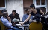 Israelis enjoy themselves at a restaurant in downtown Jerusalem on November 1, 2014. (Miriam Alster/FLASH90/File)