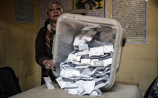 Electoral workers sort ballots to be counted at the end of the final day of the Egyptian presidential election in Cairo, Egypt, 28 March 2018. (Mohamed el-Shahed/AFP) Electoral workers sort ballots to be counted at the end of the final day of the Egyptian presidential election in Cairo, Egypt, 28 March 2018. (Mohamed el-Shahed/AFP)