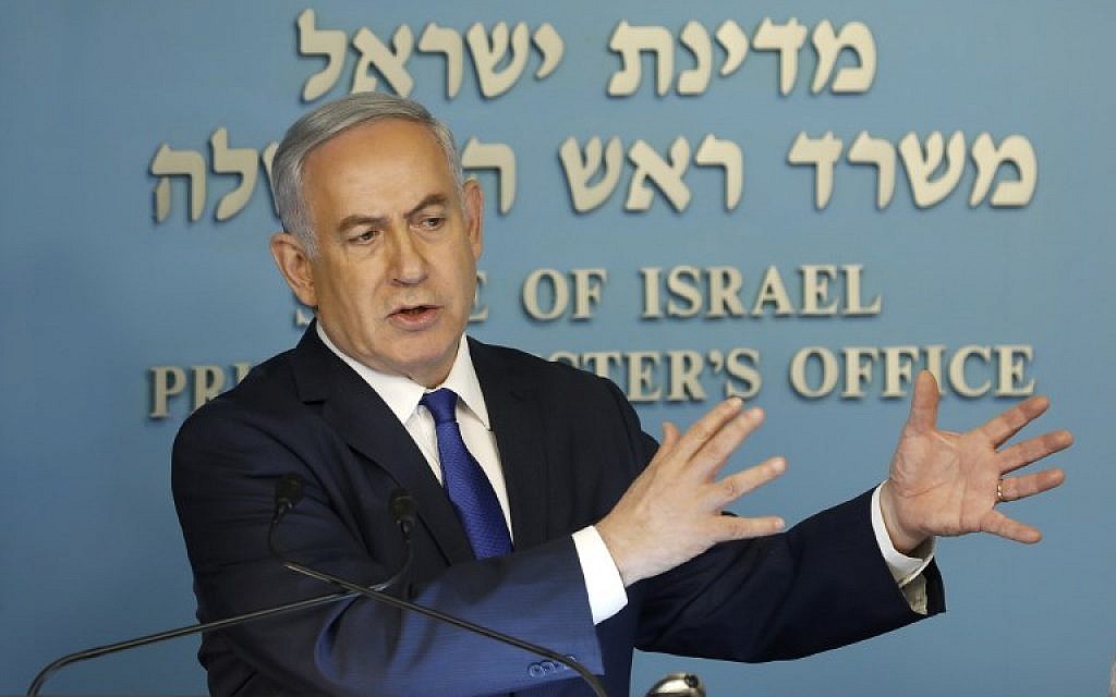 Prime Minister Benjamin Netanyahu speaks to the press in his Jerusalem office on April 2, 2018. (AFP Photo/Menahem Kahana) Prime Minister Benjamin Netanyahu speaks to the press in his Jerusalem office on April 2, 2018. (AFP Photo/Menahem Kahana)