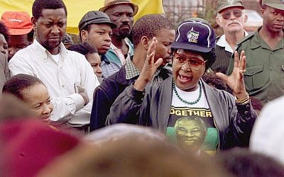 In this file photo taken on April 21, 1999 Winnie Mandela addresses a crowd, in the Mnandi squattercamp some 20 km west of Pretoria. (AFP PHOTO / Odd ANDERSEN)