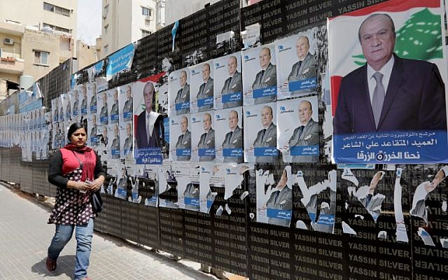 A picture taken on April 3, 2018 shows campaign posters, for the upcoming Lebanese parliamentary election, hanging in the Tariq Jedideh district of Beirut. (AFP Photo/Anwar Amro) A picture taken on April 3, 2018 shows campaign posters, for the upcoming Lebanese parliamentary election, hanging in the Tariq Jedideh district of Beirut. (AFP Photo/Anwar Amro)