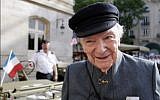 In this file photo taken on June 17, 2009 Franck Bauer, the last speaker of Radio Londres, (Radio London), a radio broadcast from 1940 to 1944 from the BBC in London to occupied France, poses in Paris. (AFP/Patrick Kovarik)