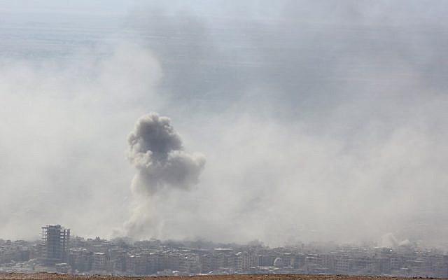 Smoke billows in the town of Douma, the last opposition holdout in Syria's Eastern Ghouta, on April 7, 2018, after Syrian regime troops resumed a military blitz to pressure rebels to withdraw. (AFP PHOTO/STRINGER) Smoke billows in the town of Douma, the last opposition holdout in Syria's Eastern Ghouta, on April 7, 2018, after Syrian regime troops resumed a military blitz to pressure rebels to withdraw. (AFP PHOTO/STRINGER)