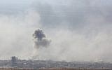Smoke billows in the town of Douma, the last opposition holdout in Syria's Eastern Ghouta, on April 7, 2018, after Syrian regime troops resumed a military blitz to pressure rebels to withdraw (AFP PHOTO / STRINGER)