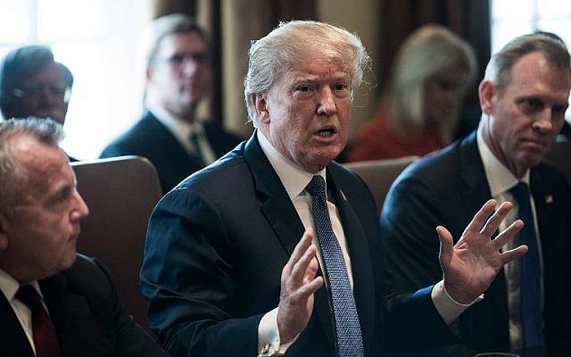 US President Donald Trump speaks during a cabinet meeting at the White House in Washington, DC, April 9, 2018. (NICHOLAS KAMM/AFP) US President Donald Trump speaks during a cabinet meeting at the White House in Washington, DC, April 9, 2018. (NICHOLAS KAMM/AFP)