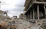 Illustrative: Destruction in the former rebel-held town of Saqba in the Eastern Ghouta region on the outskirts of the Syrian capital Damascus on April 10, 2018. (AFP Photo/Stringer)