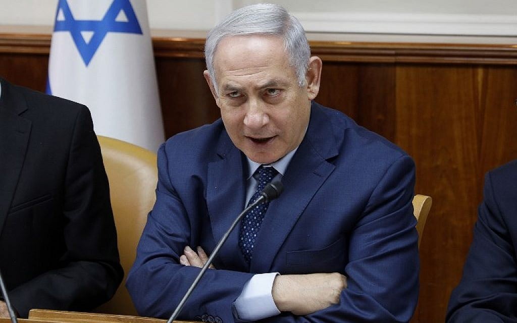 Prime Minister Benjamin Netanyahu at the start of the weekly cabinet meeting at the Prime Minister's Office in Jerusalem on April 15, 2018. (AFP Photo/Gali Tibbon)