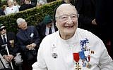 In this file photo taken on August 19, 2012 sister and former nurse Marie-Agnes Valois takes part in the 70th anniversary ceremony of the Dieppe Raid in Dieppe, northwestern France, in memory of the Second World War Allied attack on the German-occupied port of Dieppe on August 19, 1942. (AFP PHOTO / CHARLY TRIBALLEAU)