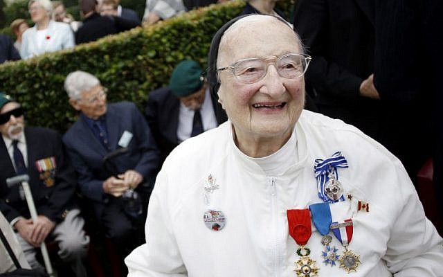 In this file photo taken on August 19, 2012 sister and former nurse Marie-Agnes Valois takes part in the 70th anniversary ceremony of the Dieppe Raid in Dieppe, northwestern France, in memory of the Second World War Allied attack on the German-occupied port of Dieppe on August 19, 1942. (AFP PHOTO / CHARLY TRIBALLEAU) In this file photo taken on August 19, 2012 sister and former nurse Marie-Agnes Valois takes part in the 70th anniversary ceremony of the Dieppe Raid in Dieppe, northwestern France, in memory of the Second World War Allied attack on the German-occupied port of Dieppe on August 19, 1942. (AFP PHOTO / CHARLY TRIBALLEAU)