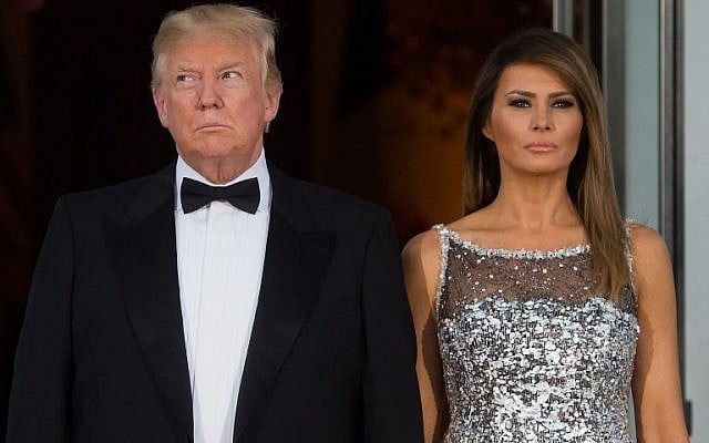 US President Donald Trump, left, and First Lady Melania Trump welcome French President Emmanuel Macron and his wife Brigitte Macron as they arrive for a State Dinner at the North Portico of the White House in Washington, DC, April 24, 2018. (SAUL LOEB/AFP) US President Donald Trump, left, and First Lady Melania Trump welcome French President Emmanuel Macron and his wife Brigitte Macron as they arrive for a State Dinner at the North Portico of the White House in Washington, DC, April 24, 2018. (SAUL LOEB/AFP)