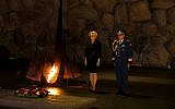 Romanian Prime Minister Viorica Dancila (L) lays a wreath at the Hall of Remembrance on April 25, 2018, during her visit to the Yad Vashem Holocaust Memorial museum in Jerusalem. (AFP Photo/Gali Tibbon)