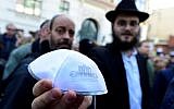 Illustrative: A man shows a kippa during the 'Berlin wears kippa' event on April 25, 2018. (AFP/Tobias Schwartz)