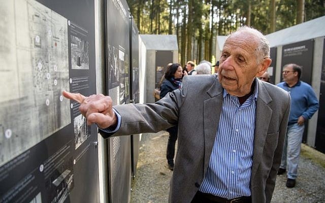Henrik Mordechai Gideon, Holocaust survivor and former prisoner at the former Muehldorfer Hart concentration camp, gives explanations on a site map prior to the inauguration of the Muehldorfer Hart camp memorial site near Waldkraiburg, southern Germany, on April 27, 2018. (AFP/dpa/Matthias Balk) Henrik Mordechai Gideon, Holocaust survivor and former prisoner at the former Muehldorfer Hart concentration camp, gives explanations on a site map prior to the inauguration of the Muehldorfer Hart camp memorial site near Waldkraiburg, southern Germany, on April 27, 2018. (AFP/dpa/Matthias Balk)