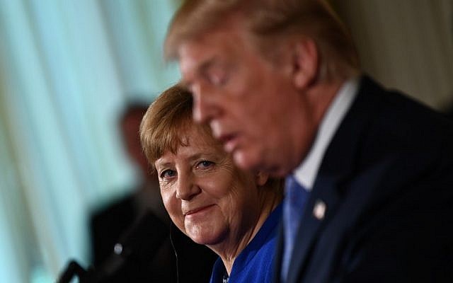 Germany's Chancellor Angela Merkel listens during a joint press conference with US President Donald Trump in the East Room of the White House on April 27, 2018 in Washington, DC. (AFP/Brendan Smialowski) Germany's Chancellor Angela Merkel listens during a joint press conference with US President Donald Trump in the East Room of the White House on April 27, 2018 in Washington, DC. (AFP/Brendan Smialowski)