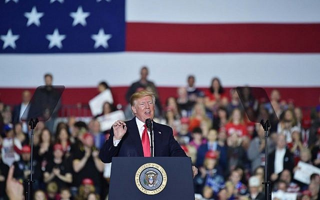 US President Donald Trump speaks during a rally at Total Sports Park in Washington, Michigan on April 28, 2018. (AFP Photo/Mandel Ngan) US President Donald Trump speaks during a rally at Total Sports Park in Washington, Michigan on April 28, 2018. (AFP Photo/Mandel Ngan)