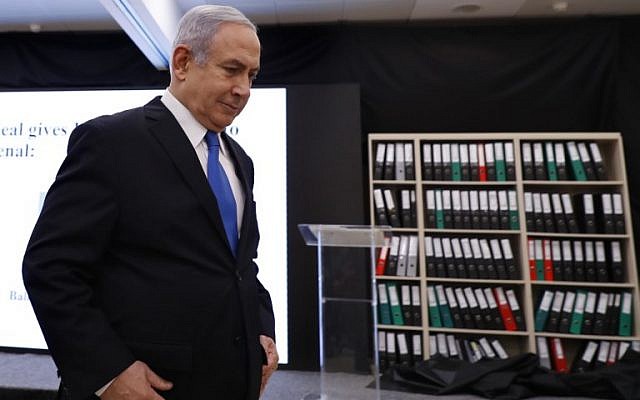 Prime Minister Benjamin Netanyahu departs after giving a speech on files obtained by Israel he says proves Iran lied about its nuclear program, at the Defense Ministry in Tel Aviv, on April 30, 2018. (AFP Photo/Jack Guez) Prime Minister Benjamin Netanyahu departs after giving a speech on files obtained by Israel he says proves Iran lied about its nuclear program, at the Defense Ministry in Tel Aviv, on April 30, 2018. (AFP Photo/Jack Guez)