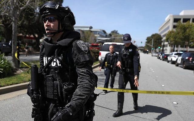 Law enforcement stands watch outside of the YouTube headquarters on April 3, 2018 in San Bruno, California. (Justin Sullivan/Getty Images/AFP) Law enforcement stands watch outside of the YouTube headquarters on April 3, 2018 in San Bruno, California. (Justin Sullivan/Getty Images/AFP)