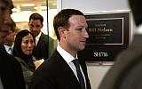 Facebook CEO Mark Zuckerberg (C) leaves after a meeting with US Sen. Bill Nelson (D-FL), ranking member of the Senate Committee on Commerce, Science, and Transportation, April 9, 2018, on Capitol Hill, in Washington, DC. (Alex Wong/Getty Images/AFP)