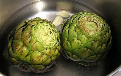 Artichokes being cooked (Pepperedjane/Public Domain/Wikimedia Commons)
