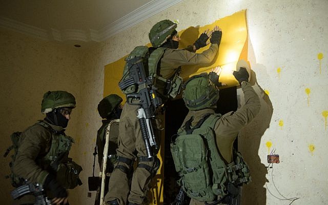 IDF combat engineers prepare to demolish the home of a Palestinian terrorist in the West Bank city of Jenin on April 24, 2018. (Israel Defense Forces/ File) IDF combat engineers prepare to demolish the home of a Palestinian terrorist in the West Bank city of Jenin on April 24, 2018. (Israel Defense Forces/ File)