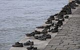 Shoes on the Danube, a Holocaust memorial to victims of the Arrow Cross who were shot on the bank of the river Danube in Budapest during the Holocaust. (Flickr/Neil)