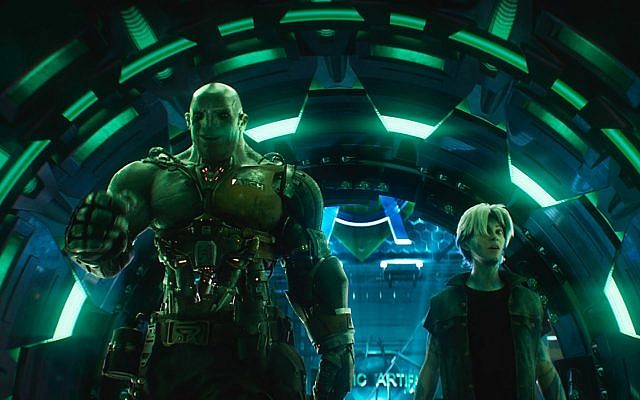 Movie characters Aech, left, and Parzival in a scene from "Ready Player One," a film by Steven Spielberg. (Warner Bros. Pictures via AP) Movie characters Aech, left, and Parzival in a scene from "Ready Player One," a film by Steven Spielberg. (Warner Bros. Pictures via AP)