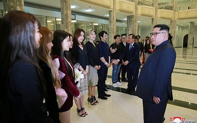 In this photo provided by the North Korean government, North Korean leader Kim Jong Un, right, talks to members of the South Korean artistic group, including the South's pop legends and popular girl band Red Velvet, after their performance in East Pyongyang Grand Theater in Pyongyang, North Korea, April 1, 2018. (Korean Central News Agency/Korea News Service via AP) In this photo provided by the North Korean government, North Korean leader Kim Jong Un, right, talks to members of the South Korean artistic group, including the South's pop legends and popular girl band Red Velvet, after their performance in East Pyongyang Grand Theater in Pyongyang, North Korea, April 1, 2018. (Korean Central News Agency/Korea News Service via AP)