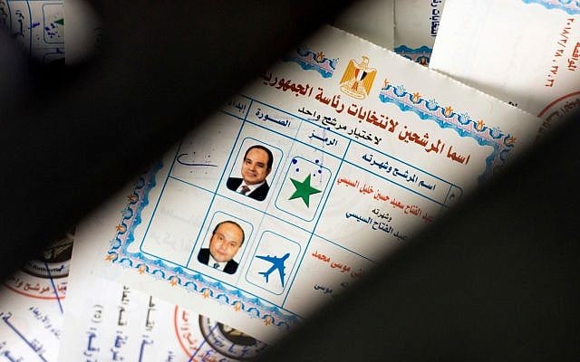 Ballots with photos and names of presidential candidates Abdel-Fattah el-Sissi, at top, and Moussa Mustafa Moussa, are visible inside a ballot box at a polling station, in Cairo, Egypt, March 26, 2018. (Amr Nabil/AP) Ballots with photos and names of presidential candidates Abdel-Fattah el-Sissi, at top, and Moussa Mustafa Moussa, are visible inside a ballot box at a polling station, in Cairo, Egypt, March 26, 2018. (Amr Nabil/AP)