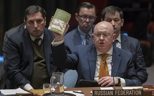 Russian Ambassador to the United Nations Vassily Nebenzia holds up a copy of 'Alice's Adventures in Wonderland' as he speaks during a Security Council meeting on the situation between Britain and Russia on April 5, 2018 at United Nations headquarters in New York. (AP Photo/Mary Altaffer) Russian Ambassador to the United Nations Vassily Nebenzia holds up a copy of 'Alice's Adventures in Wonderland' as he speaks during a Security Council meeting on the situation between Britain and Russia on April 5, 2018 at United Nations headquarters in New York. (AP Photo/Mary Altaffer)