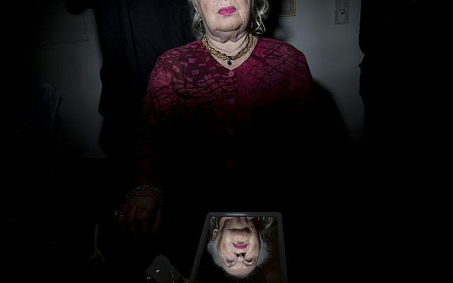 Holocaust survivor Galina gurevitch, 82, gets her hair done during a Beauty Heroines event in Ramat Gan, Israel, Monday, April 9, 2018. (AP Photo/Oded Balilty)