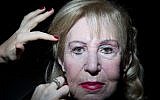 Holocaust survivor Leah Grinberg, 80, gets her hair done during a Beauty Heroines event in Ramat Gan, Israel, April 9, 2018. (AP Photo/ Oded Balilty)