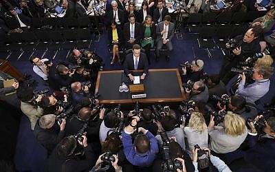 Facebook CEO Mark Zuckerberg testifies before a joint hearing of the Commerce and Judiciary Committees on Capitol Hill in Washington, Tuesday, April 10, 2018, about the use of Facebook data to target American voters in the 2016 election. (AP Photo, Alex Brandon)
