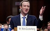 Facebook CEO Mark Zuckerberg testifies before a joint hearing of the Commerce and Judiciary Committees on Capitol Hill in Washington, Tuesday, April 10, 2018, about the use of Facebook data to target American voters in the 2016 election. (AP Photo/Andrew Harnik)