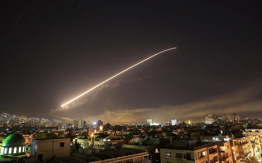 Illustrative - The Damascus sky lights up missile fire, as the US launches an attack on Syria targeting different parts of the capital, early Saturday, April 14, 2018. (AP Photo/Hassan Ammar) Illustrative - The Damascus sky lights up missile fire, as the US launches an attack on Syria targeting different parts of the capital, early Saturday, April 14, 2018. (AP Photo/Hassan Ammar)