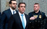 In a Monday, April 16, 2018, file photo, Michael Cohen, US President Donald Trump's personal attorney, center, leaves federal court, in New York. (AP Photo/Mary Altaffer)