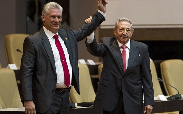 Cuba's new president Miguel Diaz-Canel, left, and former president Raul Castro, raise their arms after Diaz-Canel was elected as the island nation's new president, at the National Assembly in Havana, Cuba, April 19, 2018. (Irene Perez/Cubadebate via AP) Cuba's new president Miguel Diaz-Canel, left, and former president Raul Castro, raise their arms after Diaz-Canel was elected as the island nation's new president, at the National Assembly in Havana, Cuba, April 19, 2018. (Irene Perez/Cubadebate via AP)