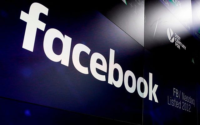 In this March 29, 2018, photo, the logo for Facebook appears on screens at the Nasdaq MarketSite in New York's Times Square. (AP Photo/Richard Drew) In this March 29, 2018, photo, the logo for Facebook appears on screens at the Nasdaq MarketSite in New York's Times Square. (AP Photo/Richard Drew)