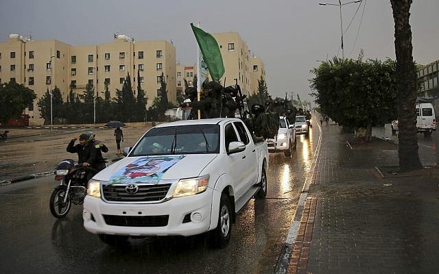 Members of of Hamas's armed wing ride vehicles on the streets of Beit Lahiya, Gaza Strip, Thursday, Dec. 8, 2016. (AP Photo/Adel Hana) Members of of Hamas's armed wing ride vehicles on the streets of Beit Lahiya, Gaza Strip, Thursday, Dec. 8, 2016. (AP Photo/Adel Hana)