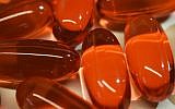 This Thursday, November 2, 2017 photo shows gel capsules of acetaminophen in New York. (AP Photo/Patrick Sison)