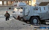 Illustrative: This photo posted on a file sharing website Wednesday, Jan. 11, 2017, by the Islamic State Group in Sinai, shows a deadly attack by militants on an Egyptian police checkpoint, Monday, Jan. 9, 2017, in el-Arish, north Sinai, Egypt. Arabic reads, "Clash with light arms with the remaining apostates left alive at the fire station checkpoint." (Islamic State Group in Sinai, via AP, File)