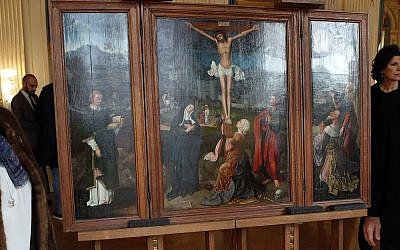Illustrative: Oil work entitled 'Triptych of the Crucifixion' attributed to Flemish painter Joachim Patinir during a ceremony of restitution at Culture ministry in Paris, Monday, Feb. 12, 2018. (AP Photo/Francois Mori)