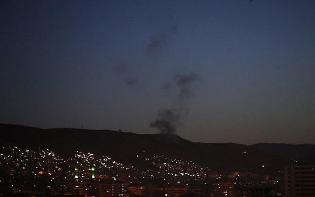 Smoke rises after airstrikes targeting different parts of the Syrian capital Damascus, Syria, early Saturday, April 14, 2018. (AP Photo/Hassan Ammar) Smoke rises after airstrikes targeting different parts of the Syrian capital Damascus, Syria, early Saturday, April 14, 2018. (AP Photo/Hassan Ammar)