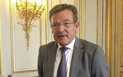Belgian Finance Minister Johan Van Overtveldt speaks with the media at his office in Brussels on Wednesday, April 18, 2018. (AP Photo/Sylvain Plazy)