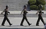 In this Wednesday, April 18, 2018 photo, North Korean soldiers march at the border village of Panmunjom in the Demilitarized Zone with South Korea. (AP Photo/Lee Jin-man)