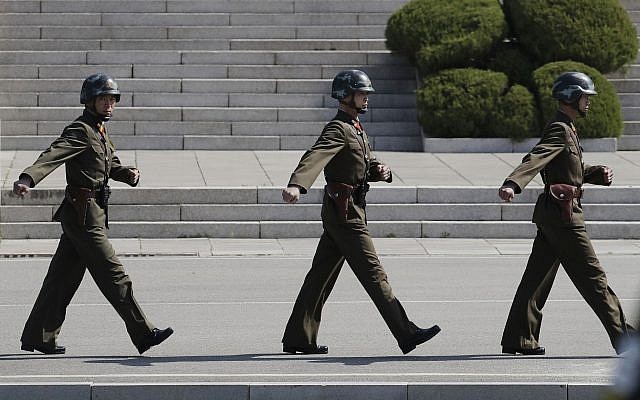 In this Wednesday, April 18, 2018 photo, North Korean soldiers march at the border village of Panmunjom in the Demilitarized Zone with South Korea. (AP Photo/Lee Jin-man)