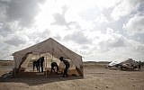 Palestinian protesters set up tents at the Gaza Strip's border with Israel, Thursday, April 19, 2018 (AP Photo/ Khalil Hamra)