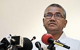 Inspector General of Royal Malaysian Police Mohamad Fuzi Harun speaks on the killing of a Palestinian man in Malaysia during a press conference in Kuala Lumpur, Malaysia, Sunday, April 22, 2018. (AP Photo/Sadiq Asyraf)