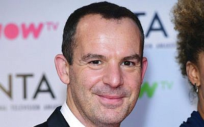 In this Jan. 23 2018 file photo, MoneySavingExpert founder Martin Lewis  poses for a photo at the NTA show,. (Ian West/ PA via AP)