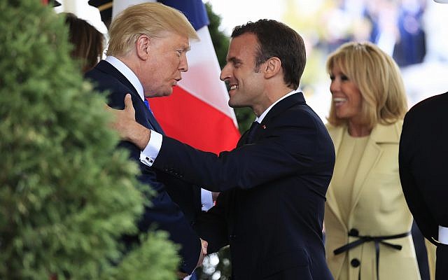 US President Donald Trump with first lady Melania Trump greet visiting French President Emmanuel Macron and his wife Brigitte Macron upon arrival at the White House in Washington, April 23, 2018. (AP Photo/Manuel Balce Ceneta) US President Donald Trump with first lady Melania Trump greet visiting French President Emmanuel Macron and his wife Brigitte Macron upon arrival at the White House in Washington, April 23, 2018. (AP Photo/Manuel Balce Ceneta)